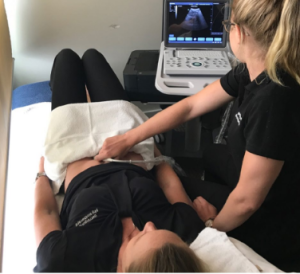 Symptom-management-ultrasound woman getting ultrasound